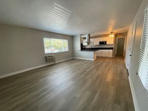 Woodland Hills apartment for rent - A room with wooden flooring and a window.