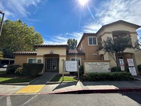 Red Bluff apartment for rent - A sunny day at Creekside Village Apartments with a clear blue sky.