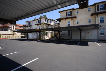 Yolo apartments parking lot with shade