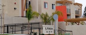 San Ysidro apartment for rent - El Pedregal Apartments exterior building and wheelchair ramp