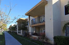 San Ysidro apartment for rent - El Pedregal Apartments exterior building and sidewalk