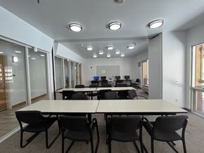 Irvine apartment for rent - A conference room with a long table and chairs.