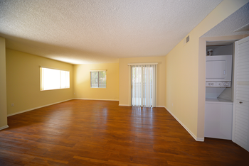 Monarch terrace unfurnished living room and laundry room with washer and dryer