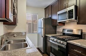 Los Angeles apartment for rent - a kitchen with stainless steel appliances and granite counter tops