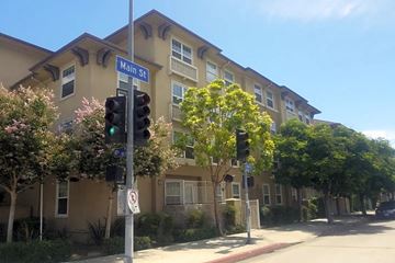 Los Angeles apartment for rent - a building on the corner of a street with a traffic light