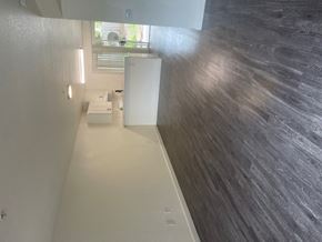Salinas apartment for rent - A bathroom with a white tub and a window.