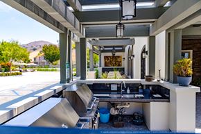 Calabasas apartment for rent - Horizons at Calabasas BBQ area with grills, a sink and a counter.