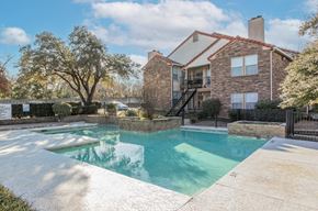 Carrollton apartment for rent - A house with a pool in the backyard.