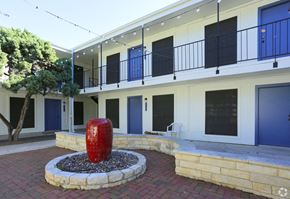 Austin apartment for rent - Soco at Alpine Outdoor Common area with fountain and Exterior building