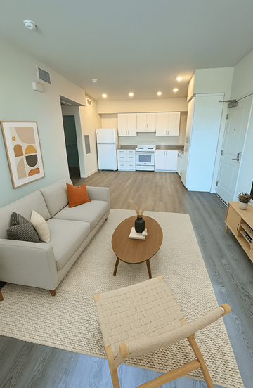 Somis apartment for rent - A living room with a grey couch and a coffee table.