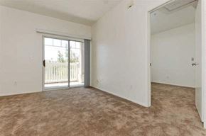 Simi Valley apartment for rent - Sorrento Villas unfurnished living room with patio
