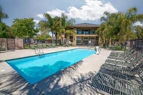Chowchilla apartment for rent - Village at Chowchilla swimming pool with chairs