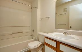Englewood apartment for rent - Centennial East bathroom with a toilet, sink, and bathtub.