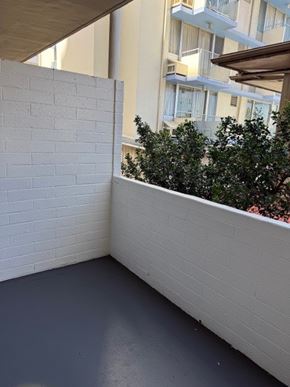 Honolulu apartment for rent - Pacific Oasis lanai/ balcony overlooking a building.