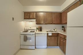 Harrisburg apartment for rent - Apartments in Harrisburg | Twin Lakes Apartments | a kitchen with white appliances