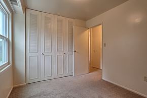 Palmyra apartment for rent - a bedroom with two closets and a door to a hallway