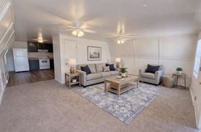 Etters apartment for rent - A living room with a rug, a couch, a coffee table, and a ceiling fan.