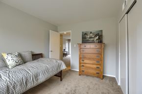 Mechanicsburg apartment for rent - Mechanicsburg Apartments | Delbrook Manor Apartments | a bedroom with a bed and a dresser