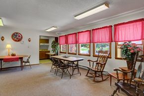 Mcconnellsburg apartment for rent - a room with a table and chairs