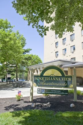 Camp Hill apartment for rent - a sign for thessalonica view apartments in front of a building