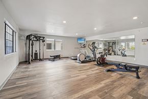 Hawthorne apartment for rent - A spacious gym with a variety of exercise equipment.