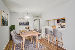 North Hollywood apartment for rent - A dining room with a table set for four.