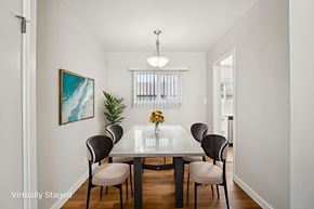 Los Angeles apartment for rent - A dining room with a table and chairs.