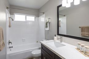 Los Angeles apartment for rent - A white bathroom with a white tub and sink.