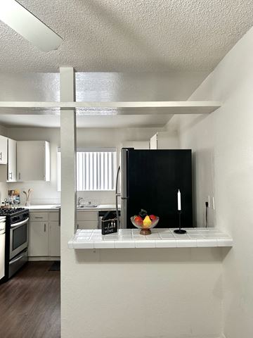 Westwood apartment for rent - a kitchen with a counter top and a refrigerator
