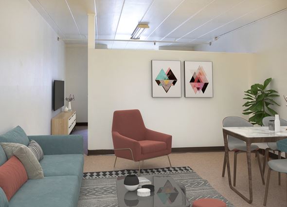 North Versailles apartment for rent - A living room with a red chair and a blue couch.