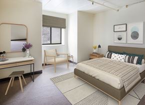 North Versailles apartment for rent - A bedroom with a bed, chair, and vanity table.