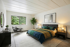 North Versailles apartment for rent - A bedroom with a large bed and a chair.