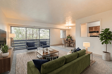 Elizabeth apartment for rent - A living room with a green couch and a wooden table.