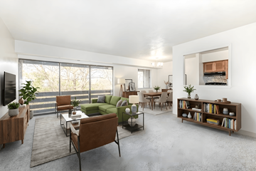 Elizabeth apartment for rent - A living room with a green couch and a coffee table.