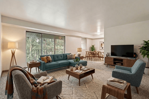 Turtle Creek apartment for rent - A living room with a couch, chairs, and a television.