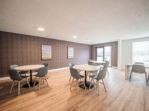 Evansville apartment for rent - A conference room with a long table and chairs.