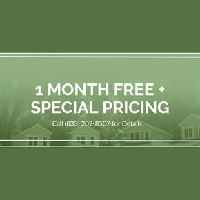 Newark apartment for rent - A promotional image offering a free first month and special pricing, with a house in the background and a phone number for details.