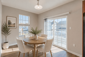 Bear townhouse for rent - A dining room with a table and chairs.