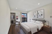 Los Angeles apartment for rent - A bedroom with a large bed and a wooden nightstand.