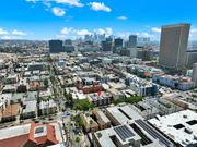 Los Angeles apartment for rent - A cityscape with buildings of various heights and a clear sky.