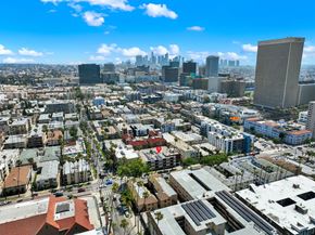 Los Angeles apartment for rent - A cityscape with buildings of various heights and a clear sky.