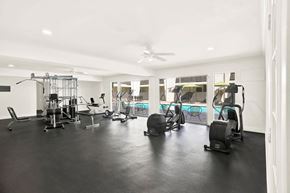 Los Angeles apartment for rent - A spacious gym with a variety of equipment including treadmills, stationary bikes, and weight machines at Bonnie Brae Apartments, Los Angeles