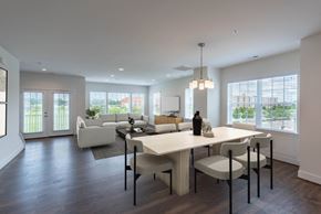 Richmond apartment for rent - A modern dining room with a table set for four.