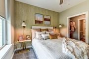 Malvern apartment for rent - A bedroom with a large bed and a window.