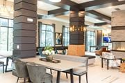 Malvern apartment for rent - A modern dining room with a large table and chairs.