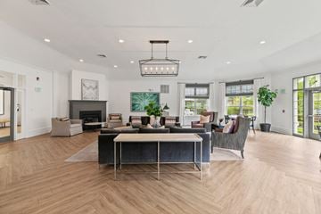 Deptford apartment for rent - a living room with a fireplace and a table and chairs