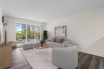 Clifton Park apartment for rent - A living room with a grey sofa and a coffee table.