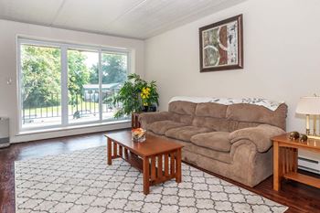 Spacious living room with large windows