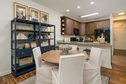 Millsboro apartment for rent - A kitchen with a dining table and chairs.