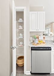 Groton apartment for rent - A kitchen with a dishwasher and an open pantry.